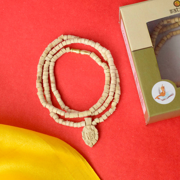 100% Original Tulsi Mala with Radha Locket – Sacred Tulsi beads (108+1) strung together with a beautiful Radha locket. Ideal for spiritual practices and meditation, this authentic mala promotes peace and devotion. Perfect for daily use or gifting. India’s Largest Pooja Accessories Brand – www.satvikworld.com.