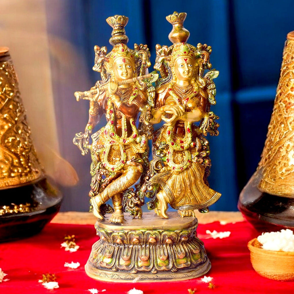 12.5 Inches Vibrant Colored Radha Krishna Brass Idol – A beautifully crafted brass statue of Radha and Krishna with vibrant colors, symbolizing divine love and joy. Perfect for your home temple or spiritual space. India’s Largest Pooja Accessories Brand – www.satvikworld.com