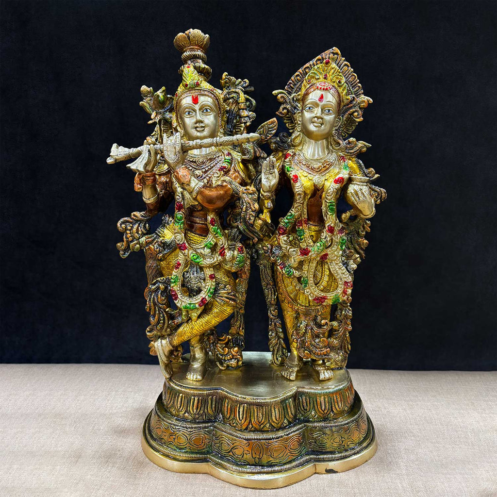 16.5 Inches Gorgeous Radha Krishna Brass Idol – A beautifully crafted idol depicting Lord Krishna and Goddess Radha, symbolizing eternal love and divine harmony. A perfect addition to your home or temple décor, bringing peace and positivity. India’s Largest Pooja Accessories Brand – www.satvikworld.com