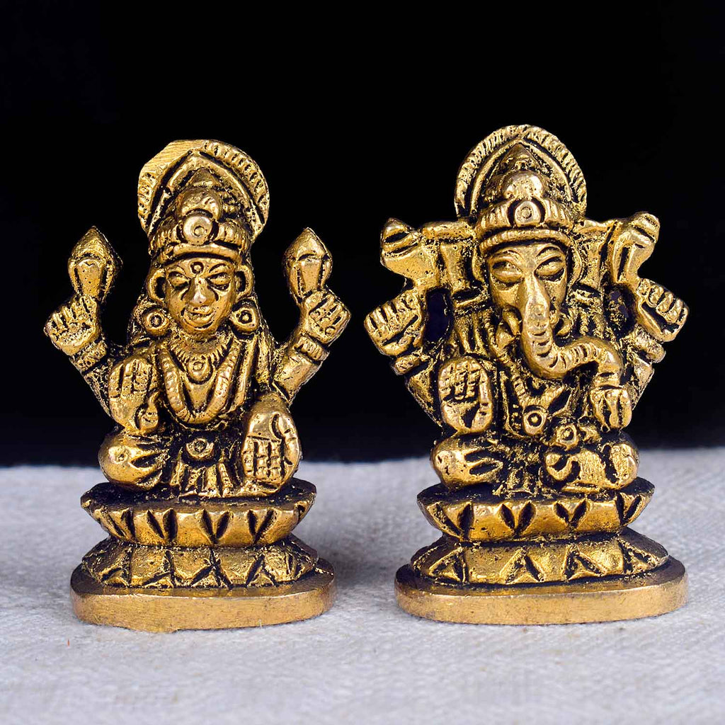 2-inch Laxmi Ganesh car dashboard idol featuring Goddess Laxmi and Lord Ganesha seated side by side with intricate detailing, vibrant colors, and traditional ornaments—symbolizing prosperity and wisdom, ideal for car or home decor. India’s Largest Pooja Accessories Brand- www.satvikworld.com