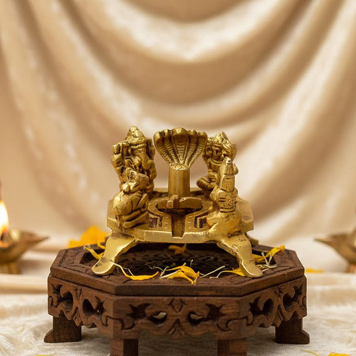 2-inch divine brass Shiv Pariwar idol set, featuring Lord Shiva, Goddess Parvati, Lord Ganesha, and Lord Kartikeya, along with a finely crafted Shivling, symbolizing divine family blessings and spiritual harmony. India’s Largest Pooja Accessories Brand – www.satvikworld.com