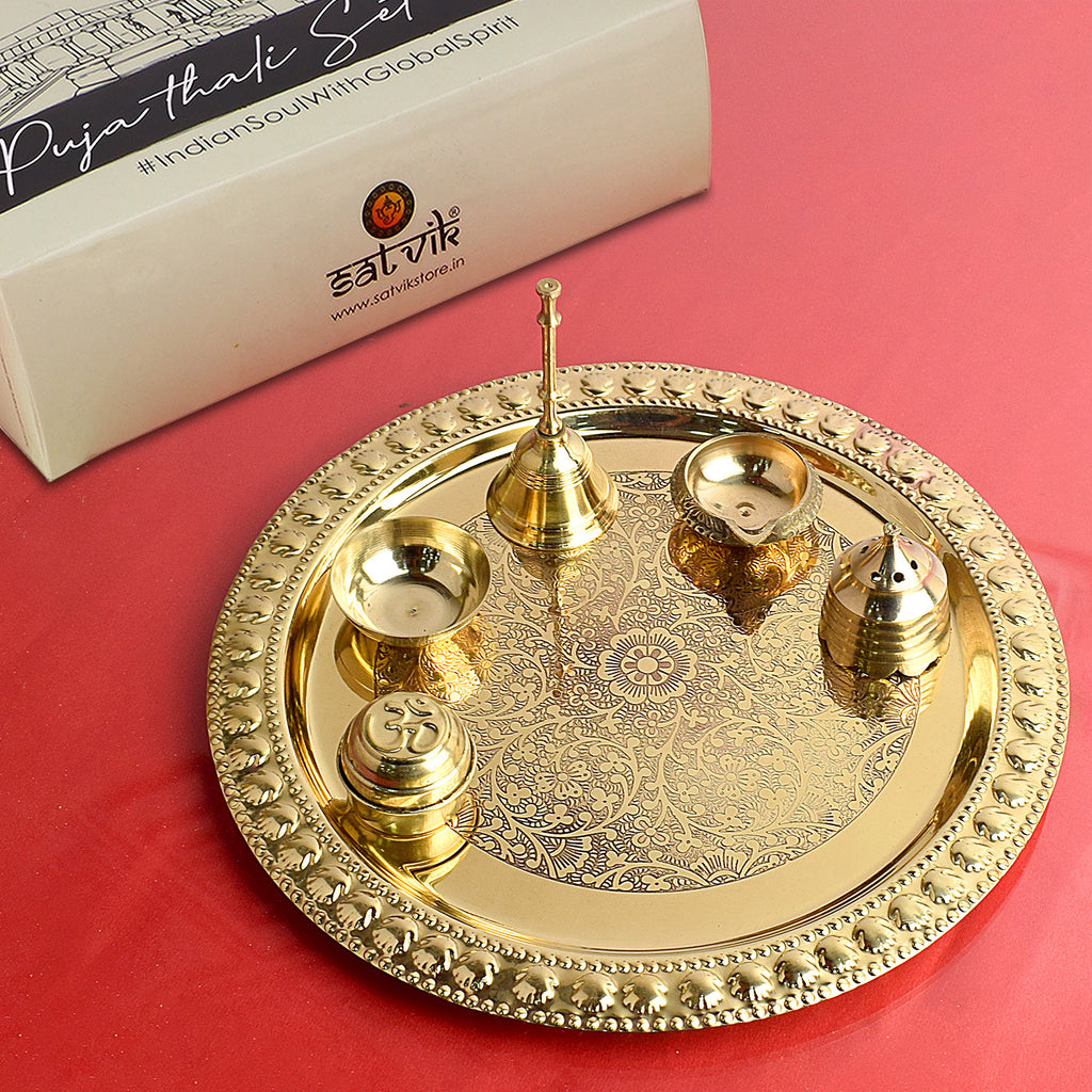 Traditional 6-piece brass puja thali set featuring essential pooja items arranged on a round decorative plate, ideal for daily rituals and festivals. India’s Largest Pooja Accessories Brand – www.satvikworld.com