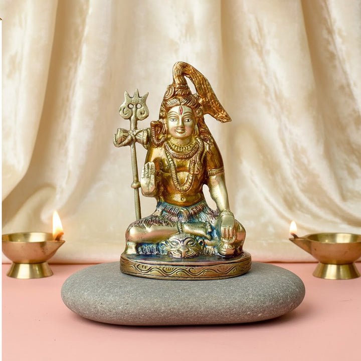 6-inch brass Shiv idol, a divine Lord Shiva statue depicting the serene and powerful form of the deity. Perfect for pooja rooms and spiritual spaces. India’s Largest Pooja Accessories Brand – www.satvikworld.com