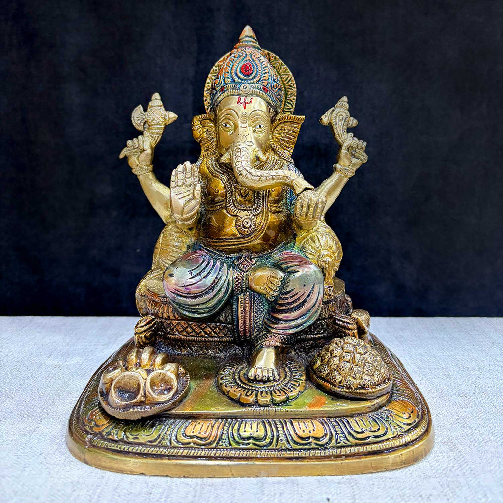 9.1 Inch Sacred Ganesh Idol, a beautifully crafted statue symbolizing the blessings of success, prosperity, and good fortune. Perfect for home or temple decor, bringing divine energy and harmony. India’s Largest Pooja Accessories Brand – www.satvikworld.com