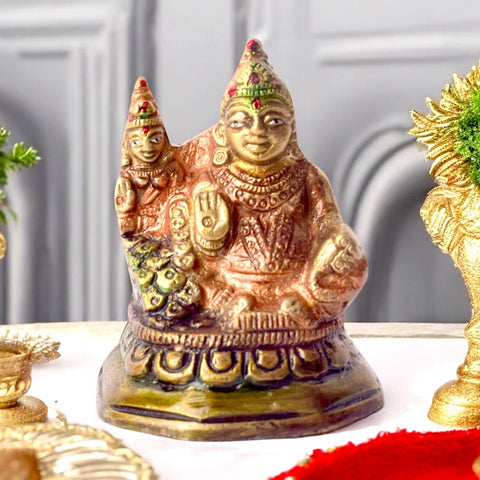 Auspicious brass idol of Lord Kuber with Goddess Laxmi Ji, symbolizing wealth, prosperity, and divine blessings. Intricately crafted, ideal for worship, home temples, or as a spiritual décor piece. India’s Largest Pooja Accessories Brand – www.satvikworld.com