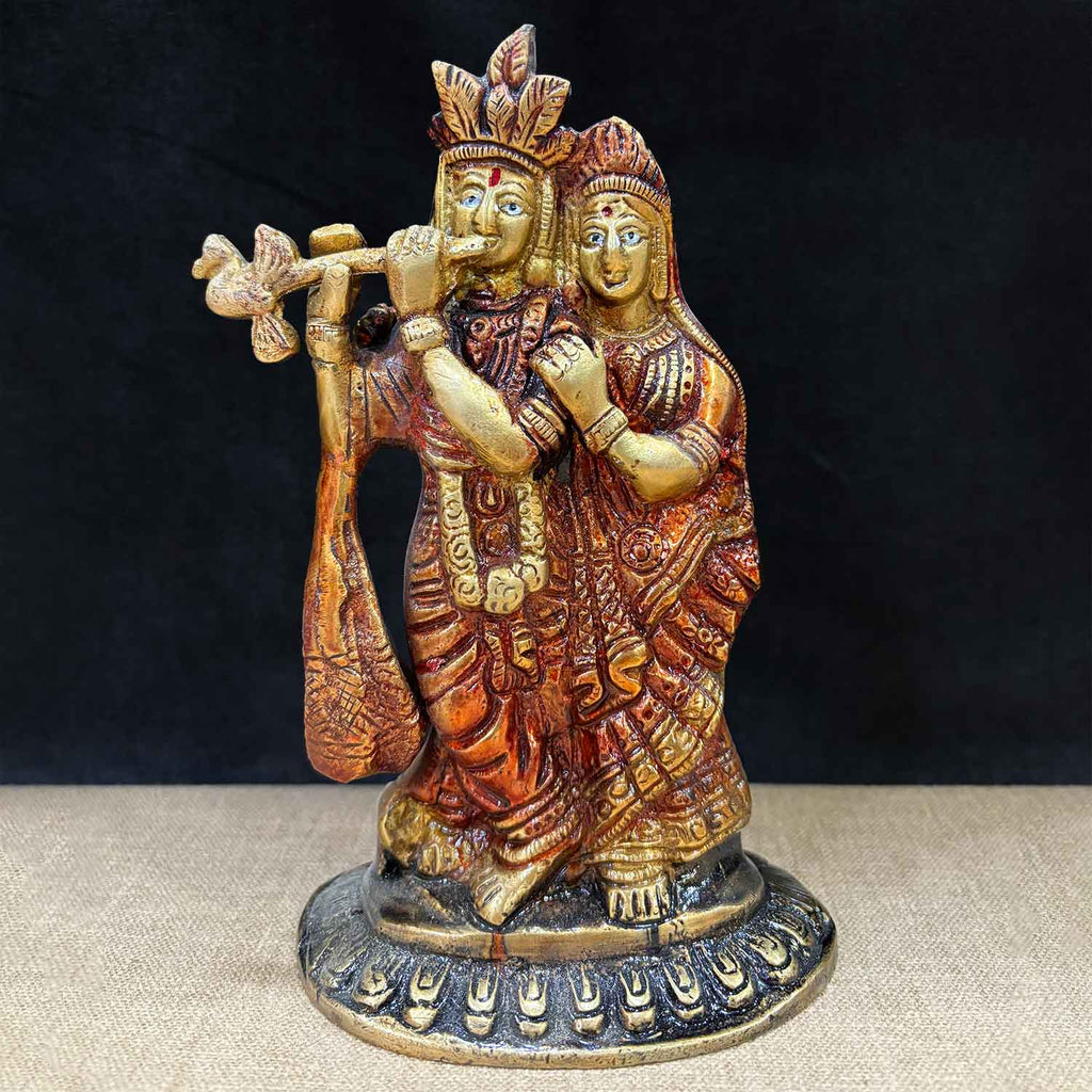 7.1 Inch brass Radha Krishna idol pair in a graceful standing posture, richly detailed with traditional attire and ornaments, symbolizing eternal love and devotion. India’s Largest Pooja Accessories Brand – www.satvikworld.com