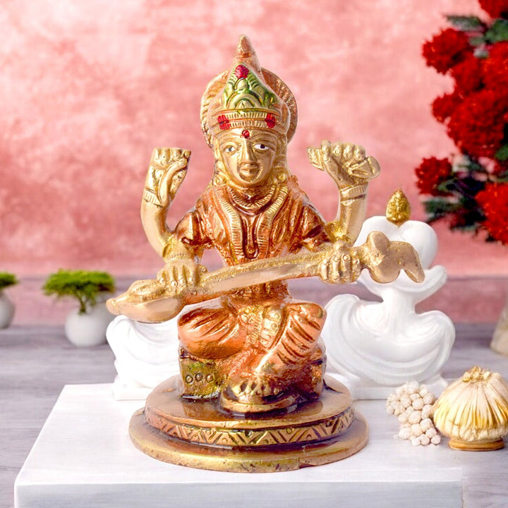 Exquisite handcrafted brass Saraswati idol, intricately designed, depicting the Goddess of wisdom and knowledge, holding her veena and book. Perfect for worship, study spaces, or as a thoughtful gift. India’s Largest Pooja Accessories Brand – www.satvikworld.com
