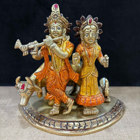 5.5 Inch Radha Krishna Pair Idol with Cow – Beautiful Brass Statue of Lord Radha and Krishna with a Cow, Symbolizing Divine Love, Harmony, and Spiritual Bliss, Perfect for Temple, Home Decor, and Puja, Intricately Crafted with Fine Detailing, Ideal for Mandir Decoration, Buy Radha Krishna Idol with Cow Online, Affordable God Statue Prices | India’s Largest Pooja Accessories Brand – www.satvikworld.com