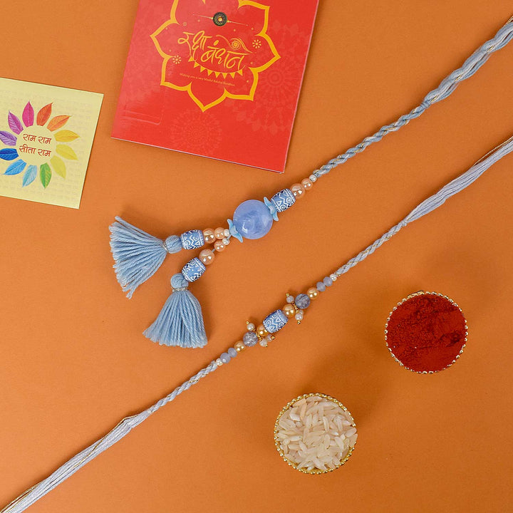 Designer Couple Rakhi Set for Bhaiya and Bhabhi with Roli Chawal and Ram Sita Stickers – Raksha Bandhan Gift Combo. India’s Largest Brass Idols Brand - www.satvikworld.com