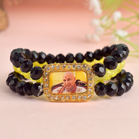 Black & Neon Yellow Triple Layer Guruji Swaroop Bracelet featuring sleek black beads with electric neon yellow middle layer and Jai Guruji Swaroop – perfect for spiritual wear, meditation, and gifting. India’s Largest Pooja Accessories Brand – www.satvikworld.com