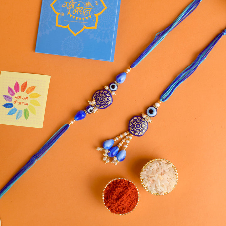 Designer Couple Rakhi Set for Bhaiya and Bhabhi with Roli Chawal and Ram Sita Stickers – Raksha Bandhan Gift Combo. India’s Largest Brass Idols Brand - www.satvikworld.com