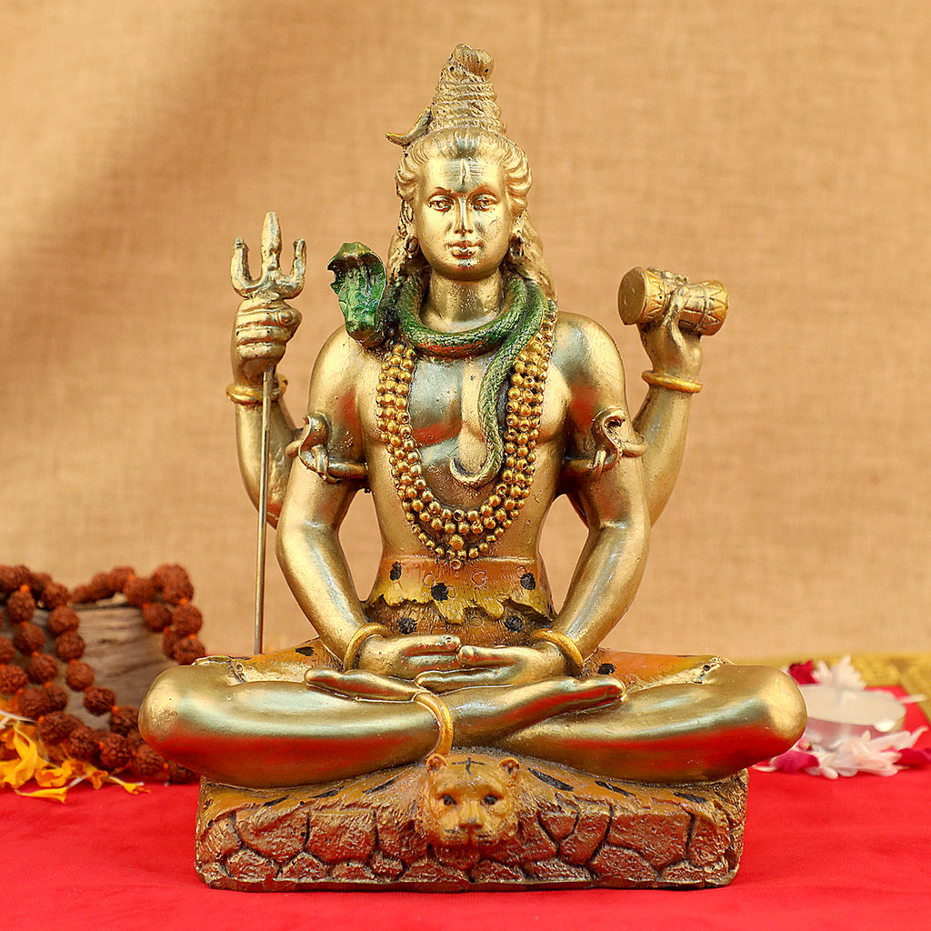 Divine Yogi Lord Shiva statue in a serene mudra pose, intricately crafted to capture the deity’s peaceful and meditative essence. Symbolizing spiritual enlightenment and divine energy, perfect for worship or spiritual décor. India’s Largest Pooja Accessories Brand – www.satvikworld.com