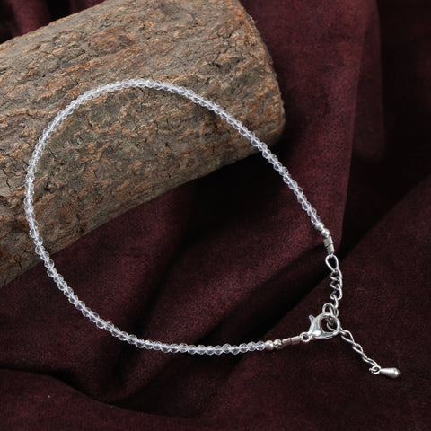 Clear crystal healing stone anklet for energy clarity and balance. India’s Largest Puja Accessories Brand- www.satvikworld.com