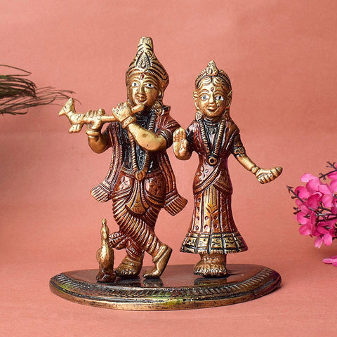 Gorgeous brass idol of Radha Rani and Krishna Kanhaiya, intricately crafted to capture their divine love and grace, symbolizing devotion, harmony, and spiritual unity. Perfect for worship or home décor. India’s Largest Pooja Accessories Brand – www.satvikworld.com