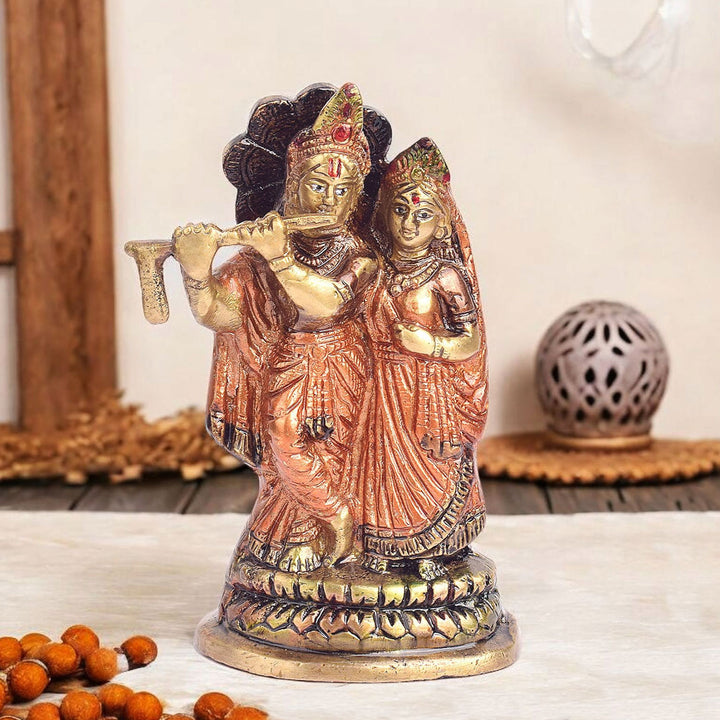 5.4-inch Radha Krishna pair idol, beautifully crafted to depict Lord Krishna and Radha in a divine and loving embrace, symbolizing love, devotion, and spiritual harmony. Ideal for home temple décor or as a gift. India’s Largest Pooja Accessories Brand – www.satvikworld.com