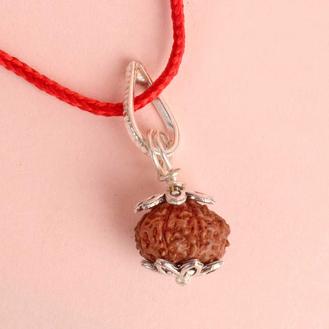 Certified 9 Mukhi Rudraksha Pendant with metal capping for power and protection. India’s Premium Rudraksha Jap Mala Store- www.satvikworld.com

