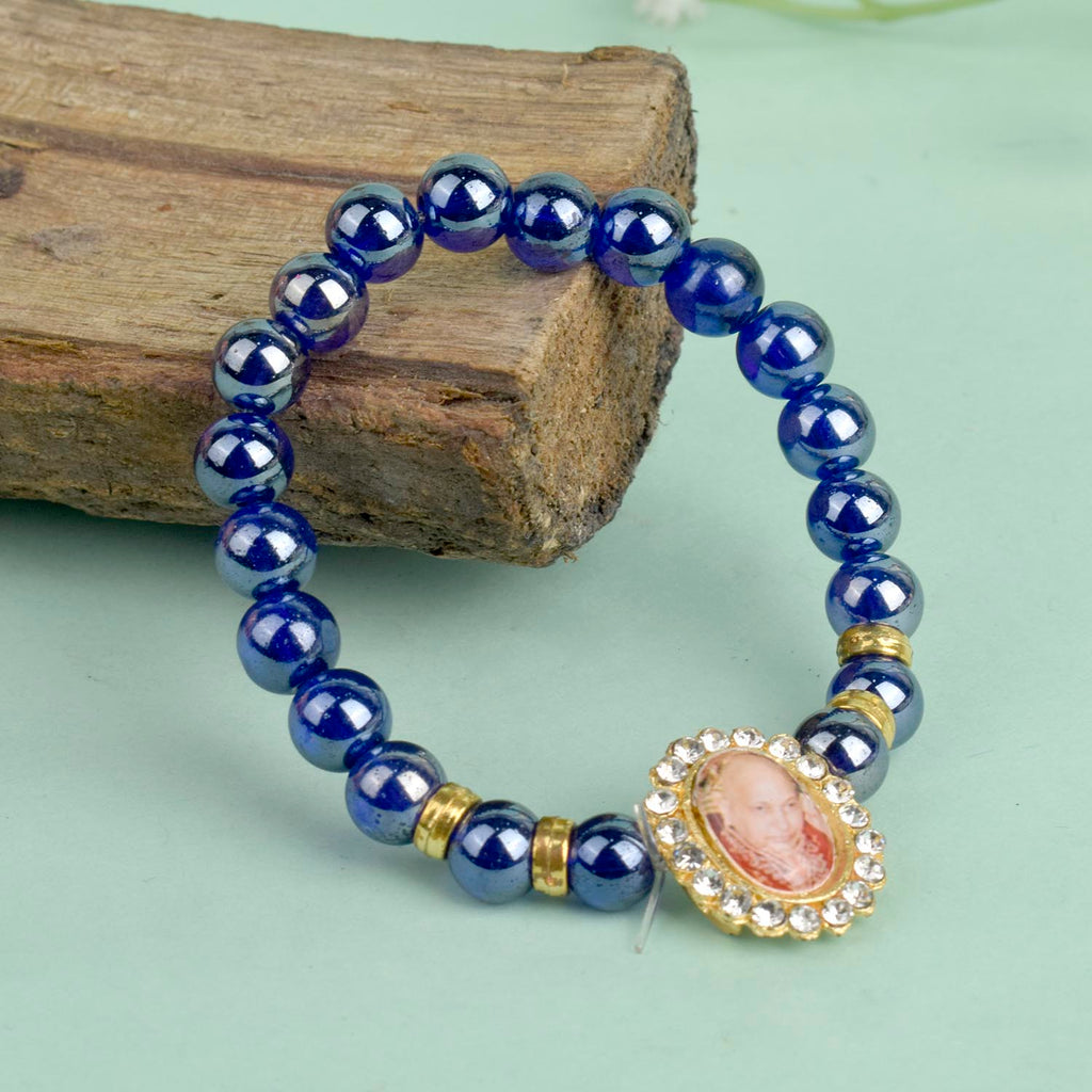 Dark Blue Shiny Beads Single Layer Guruji Swaroop Bracelet featuring shimmering dark blue beads and Jai Guruji Swaroop – perfect for minimalist spiritual wear, meditation, and gifting. India’s Largest Pooja Accessories Brand – www.satvikworld.com