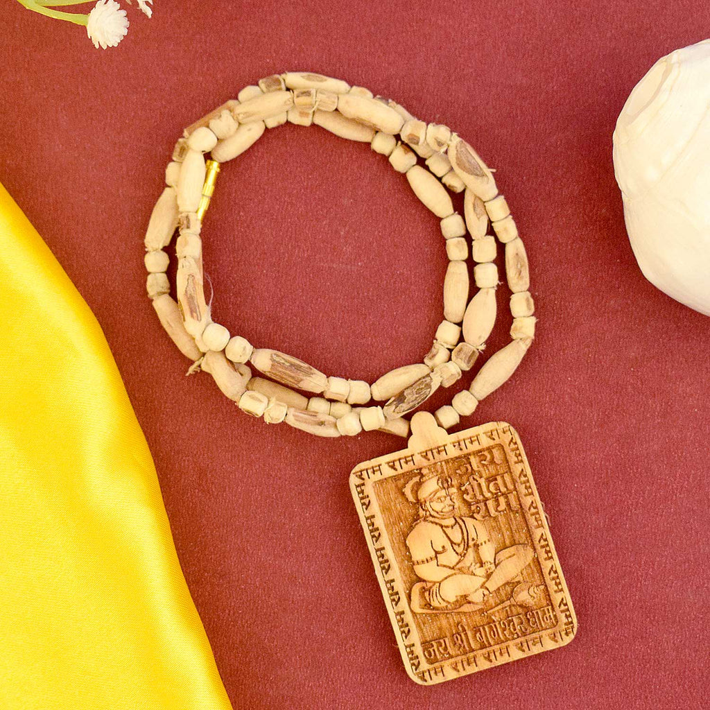 Buy 100% Original Tulsi Mala with Jai Sita Ram / Jai Shri Bageshwar Dham Wooden Locket, ideal for daily chanting, meditation, and spiritual devotion. Made from pure Tulsi beads, this sacred mala brings divine protection, focus, and peace to your spiritual routine. India’s Largest Brass Idols Brand - www.satvikworld.com
