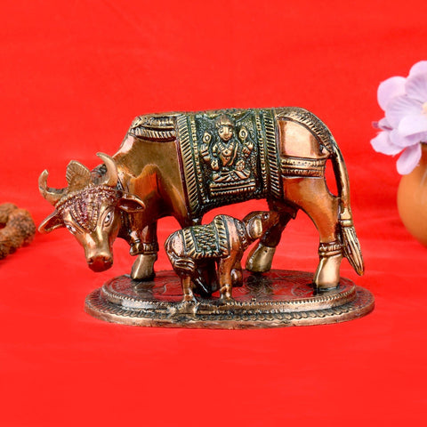 Divine brass Kamdhenu cow with calf idol, symbolizing prosperity, fertility, and divine blessings. Perfect for pooja rooms and spiritual spaces. India’s Largest Pooja Accessories Brand – www.satvikworld.com