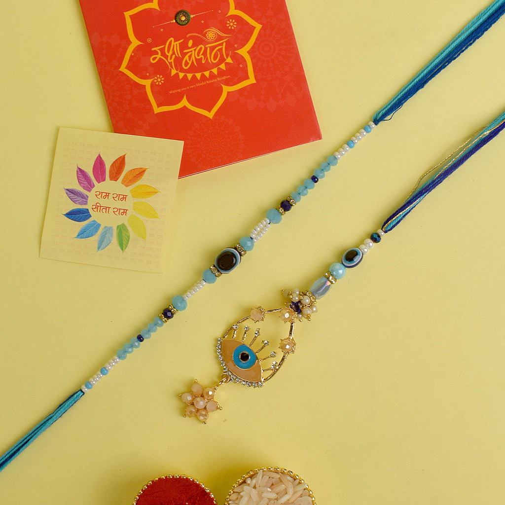 Designer Couple Rakhi Set for Bhaiya and Bhabhi with Roli Chawal and Ram Sita Stickers – Raksha Bandhan Gift Combo. India’s Largest Brass Idols Brand - www.satvikstore.in