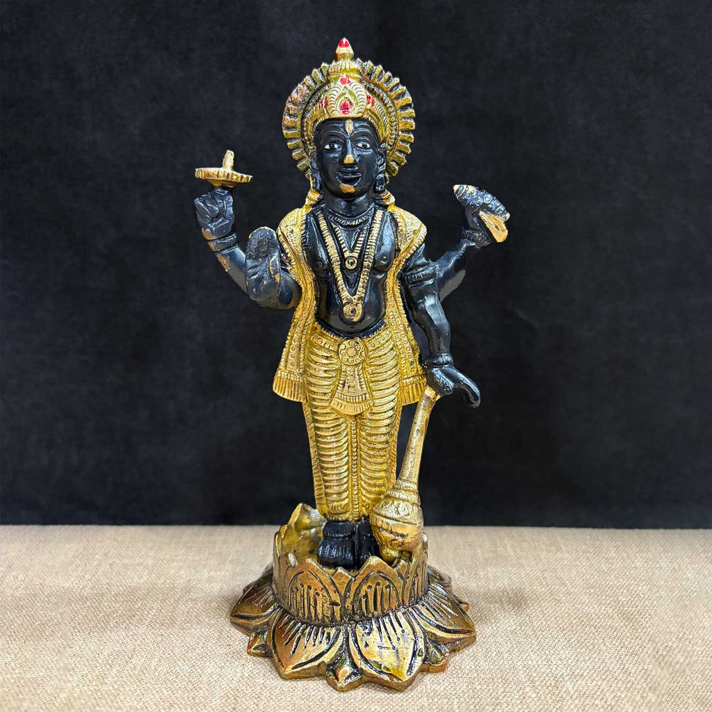 7-inch majestic Lord Vishnu Ji statue, beautifully crafted in black and gold, symbolizing divine presence, protection, and cosmic harmony. Ideal for pooja rooms, home temples, or as a spiritual gift to invoke blessings and peace. India’s Largest Pooja Accessories Brand – www.satvikworld.com