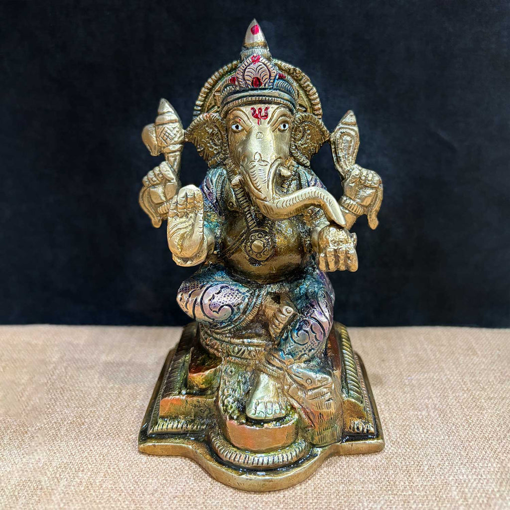 5.1 Inch brass Ganesh idol symbolizing wisdom and prosperity, intricately carved and seated in a calm, traditional posture with detailed ornaments. Ideal for home temple or gifting. India’s Largest Pooja Accessories Brand – www.satvikworld.com
