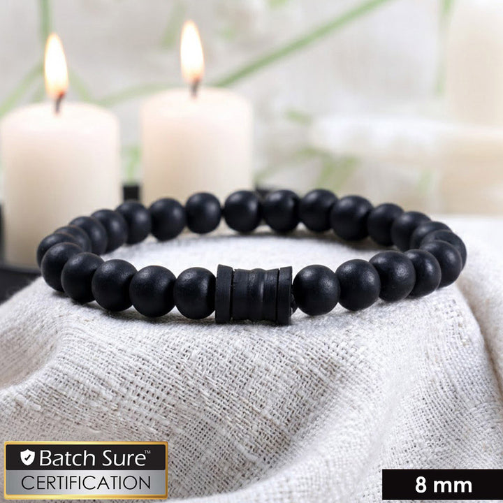 8mm black karungali bead bracelet with a central damru-shaped bead on an elastic cord, shown on a plain background. India’s Largest Puja Accessories Brand- www.satvikworld.com