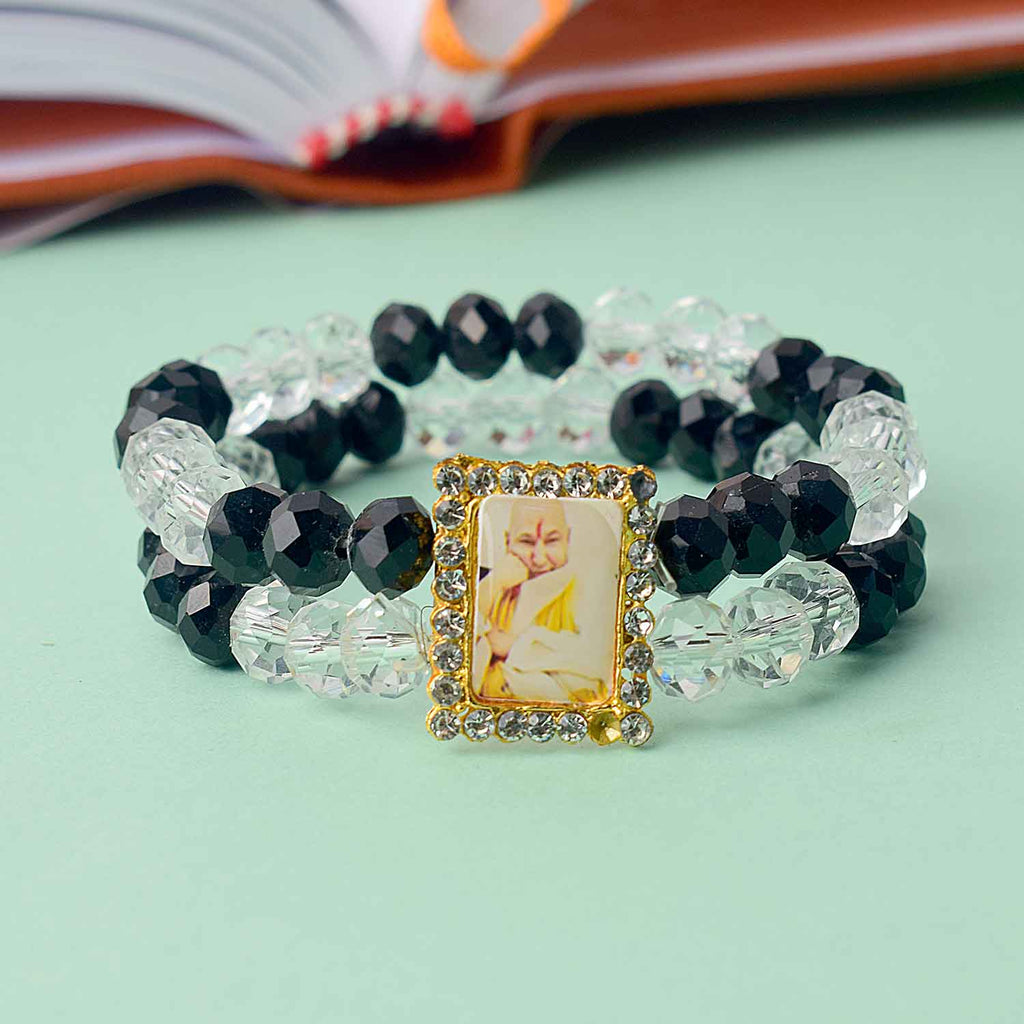 Guruji Swaroop Bracelet featuring clear and black beads – perfect for daily wear, spiritual occasions, and gifting. India’s Largest Pooja Accessories Brand – www.satvikworld.com