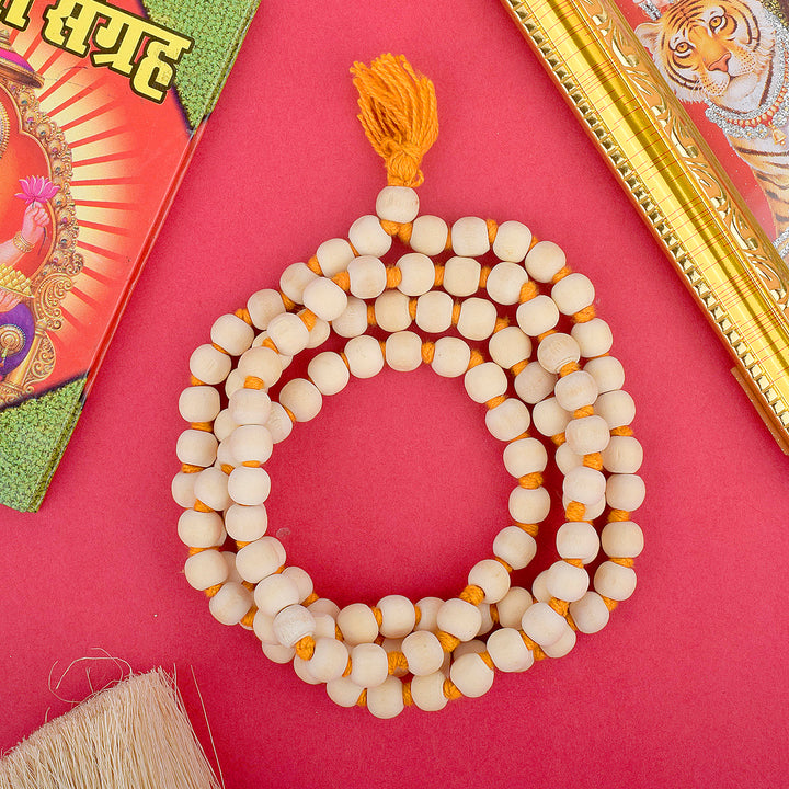 Handcrafted Wooden White Jap Mala with 108+1 beads, ideal for mantra chanting and meditation. Made from high-quality white wood, this mala offers a natural and grounding energy for spiritual practices. India’s Largest Pooja Accessories Brand – www.satvikworld.com
