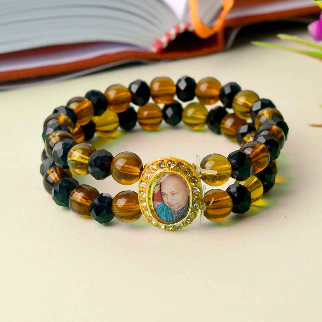 Jai Guruji Swaroop Bracelet with black and brown spiritual beads, handcrafted for divine grace and daily spiritual wear. India’s Largest Pooja Accessories Brand – www.satvikworld.com