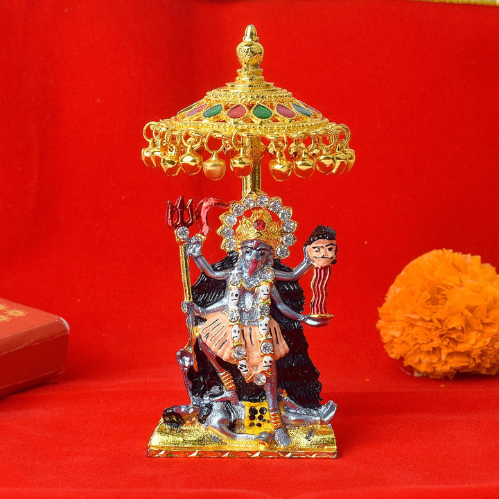 Goddess Kaali Idol with ornate Chatra canopy, depicting the fierce and divine form of Maa Kali, perfect for home temples, spiritual decor, and devotional worship. India’s Largest Pooja Accessories Brand – www.satvikworld.com
