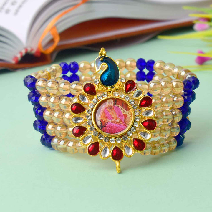 Multilayered Guruji Swaroop Bracelet made with golden and assorted colored beads – perfect for pooja, daily wear, and gifting. India’s Largest Pooja Accessories Brand – satvikworld.com