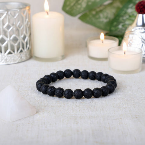 Natural black lava stone healing beaded bracelet with porous 8mm volcanic beads. India’s Largest Pooja Accessories Brand - www.satvikworld.com