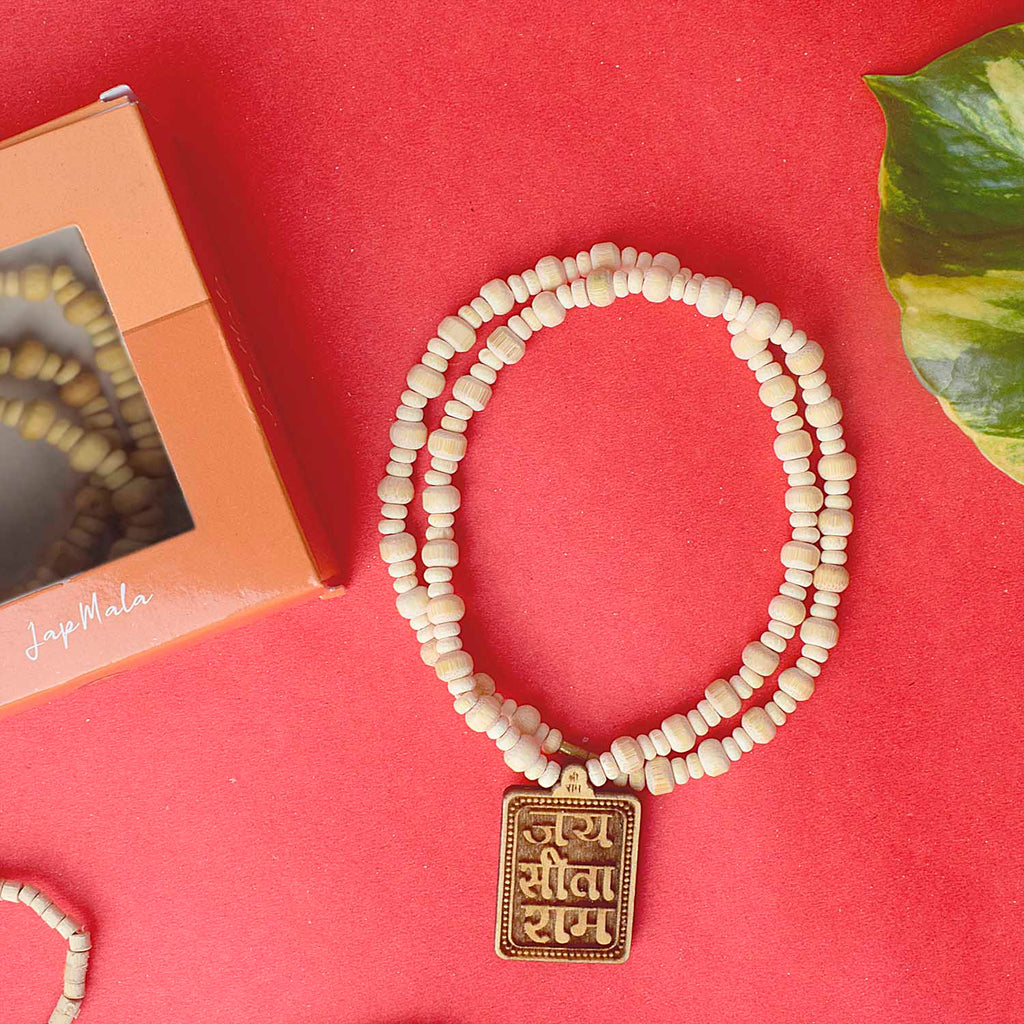 Regular Wooden Beads Mala with Sita Ram Locket, perfect for meditation, mantra chanting, and spiritual practices. The mala is adorned with a sacred Sita Ram locket, symbolizing devotion and blessings. India’s Largest Pooja Accessories Brand – www.satvikworld.com