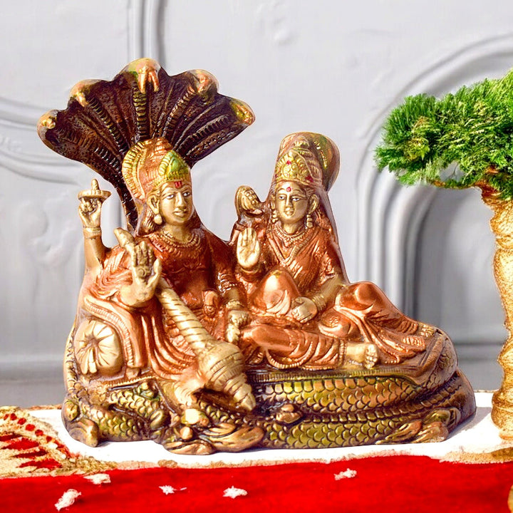 Sacred Brass Vishnu Laxmi Statue – Large, Depicting Lord Vishnu and Goddess Laxmi in Their Divine and Majestic Form. Handcrafted with Exquisite Detail, This Idol Symbolizes Prosperity, Abundance, and Protection. Perfect for Temple, Pooja, and Home Décor to Invoke Blessings of Wealth, Harmony, and Divine Grace. India’s Largest Pooja Accessories Brand – www.satvikworld.com
