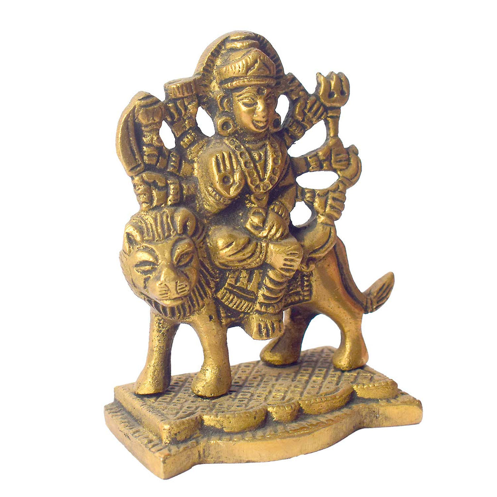 3.1-inch Sherawali Mata idol crafted from brass, featuring the goddess majestically seated on a lion with finely detailed ornaments and weapons, placed on a decorative base—ideal for invoking divine strength and blessings in home or car settings. India’s Largest Pooja Accessories Brand- www.satvikworld.com