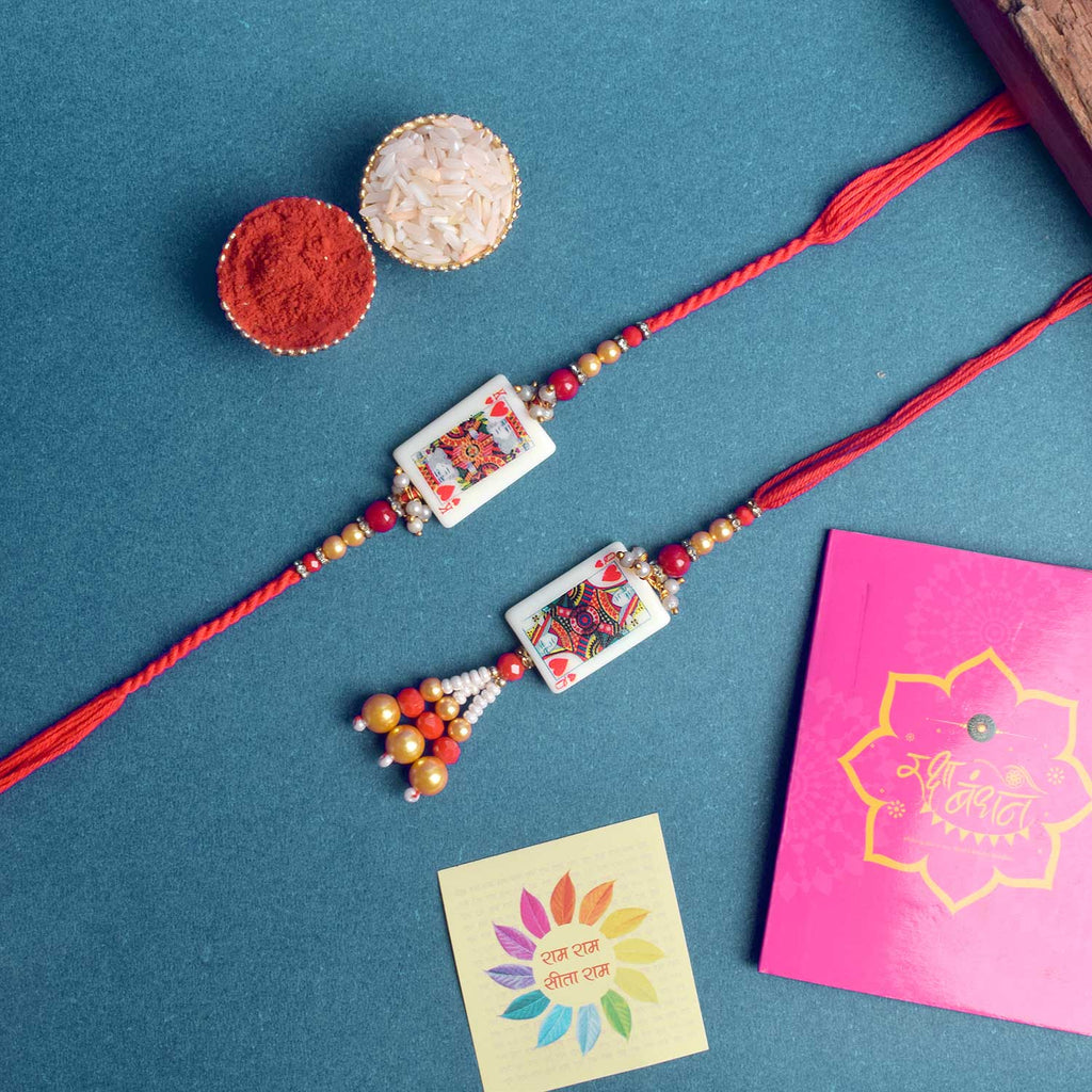 Designer Couple Rakhi Set for Bhaiya and Bhabhi with Roli Chawal and Ram Sita Stickers – Raksha Bandhan Gift Combo. India’s Largest Brass Idols Brand - www.satvikworld.com