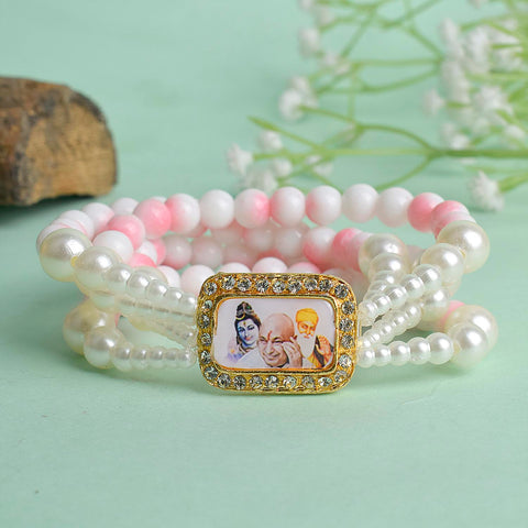 White & Pink Marble with White Pearl Four Layer Guruji Swaroop Bracelet featuring soft pink marble effect beads, elegant white beads, and luminous white pearls with Jai Guruji Swaroop – perfect for spiritual wear, festive gifting, and daily devotion. India’s Largest Pooja Accessories Brand – www.satvikworld.com
