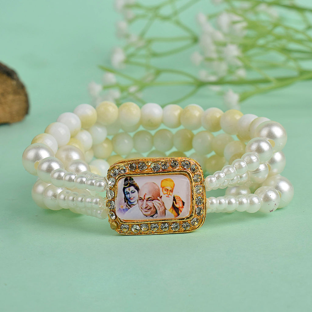 Yellow & White Marble with White Pearl Four Layer Guruji Swaroop Bracelet featuring vibrant yellow beads, elegant white marble effect beads, and luminous white pearls with Jai Guruji Swaroop – perfect for spiritual wear, festive gifting, and daily devotion. India’s Largest Pooja Accessories Brand – www.satvikworld.com