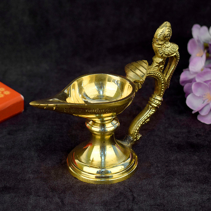 Beautiful traditional brass Chirag Diya with antique finish, ideal for pooja rituals and festive home decor. India’s Largest Pooja Accessories Brand – www.satvikworld.com