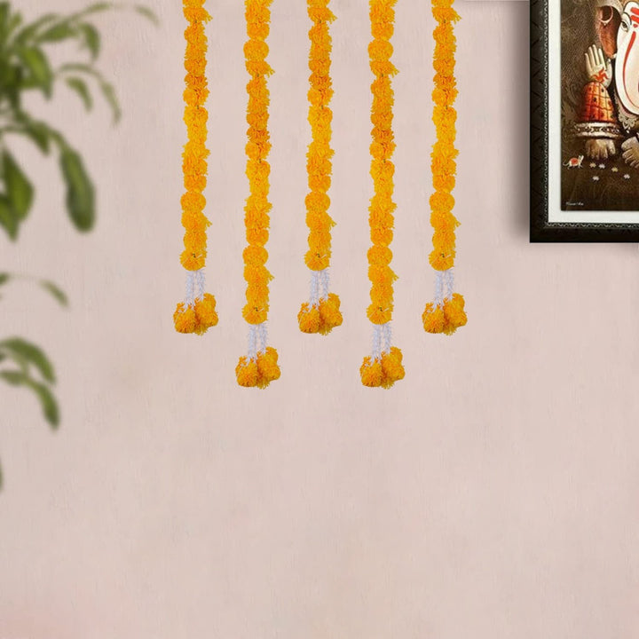 Alluring Orange Backdrop Latkan with vibrant orange fabric and decorative hanging elements for festive and wedding decor. India’s Largest Pooja Accessories Brand – www.satvikworld.com

 