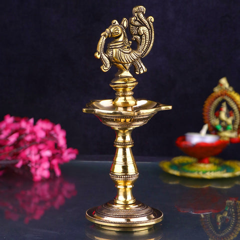 Brass Panchmukhi Diya/Oil Lamp featuring five wicks, ideal for religious ceremonies, adding a divine touch to your pooja space with intricate brass craftsmanship. India’s Largest Pooja Accessories Brand – www.satvikworld.com