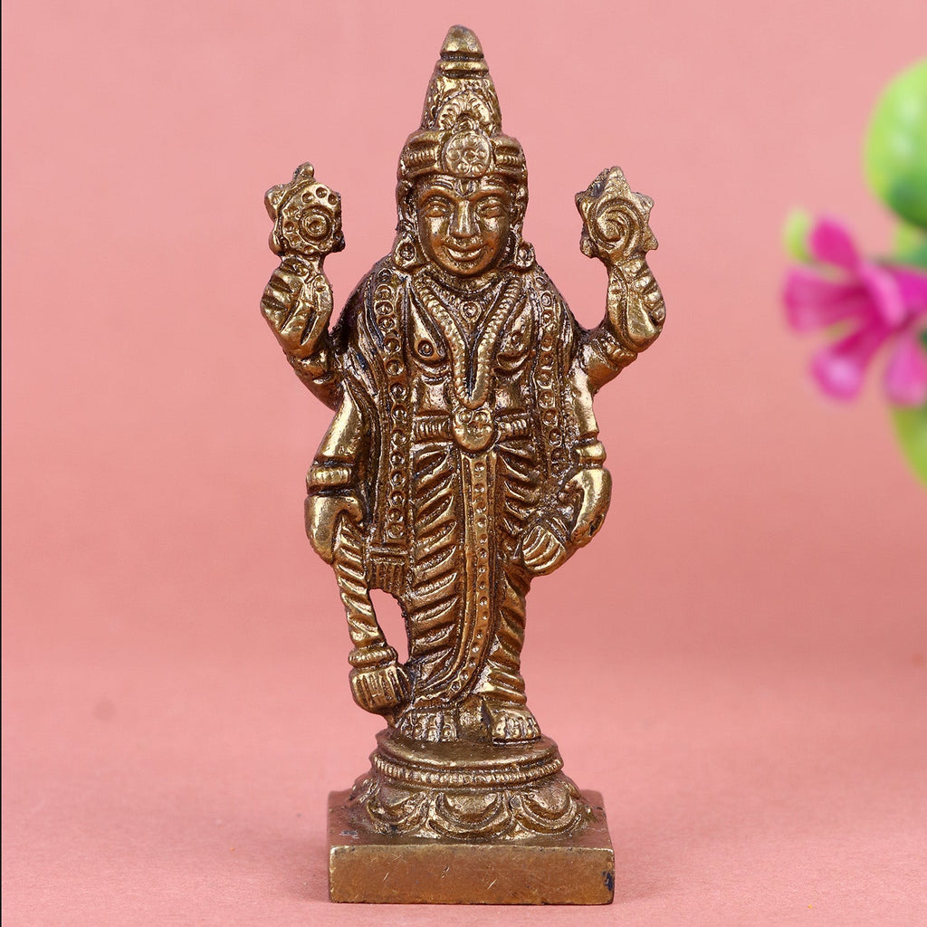 Brass Satyanarayan idol in a standing posture, intricately detailed with divine symbols—conch, discus, mace, and lotus—symbolizing truth, prosperity, and protection for home or puja use. India’s Largest Pooja Accessories Brand- www.satvikworld.com
