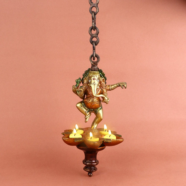 Dancing Ganesha Panchmukhi Hanging Diya, featuring an elegant design with five wicks and intricate details of Lord Ganesha in a dancing posture, perfect for religious ceremonies and home decoration. India’s Largest Pooja Accessories Brand – www.satvikworld.com