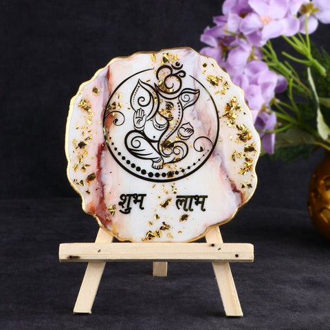 Decorative Ganesha Shubh Labh frame with stand made using epoxy resin, featuring vibrant colors and traditional design for auspicious home or office decor.India’s Largest Pooja Accessories Brand – www.satvikworld.com