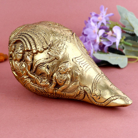 Elegant engraved brass Vishnu Shankh, featuring intricate carvings and designs, symbolizing divine blessings and prosperity. India’s Largest Pooja Accessories Brand – www.satvikworld.com