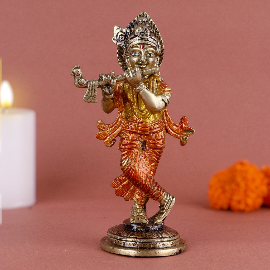 Enchanting brass idol of Lord Krishna, intricately crafted with divine charm, depicting him with a flute, symbolizing love, devotion, and spiritual harmony. Perfect for worship or as a decorative centerpiece. India’s Largest Pooja Accessories Brand – www.satvikworld.com