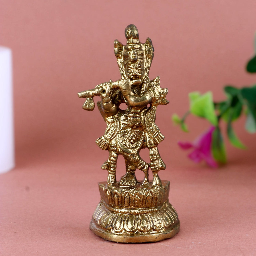 Stunning brass idol of Lord Krishna playing the flute, intricately crafted with fine details and traditional attire, capturing the essence of divine music and grace. Ideal for spiritual décor or puja rituals. India’s Largest Pooja Accessories Brand – www.satvikworld.com