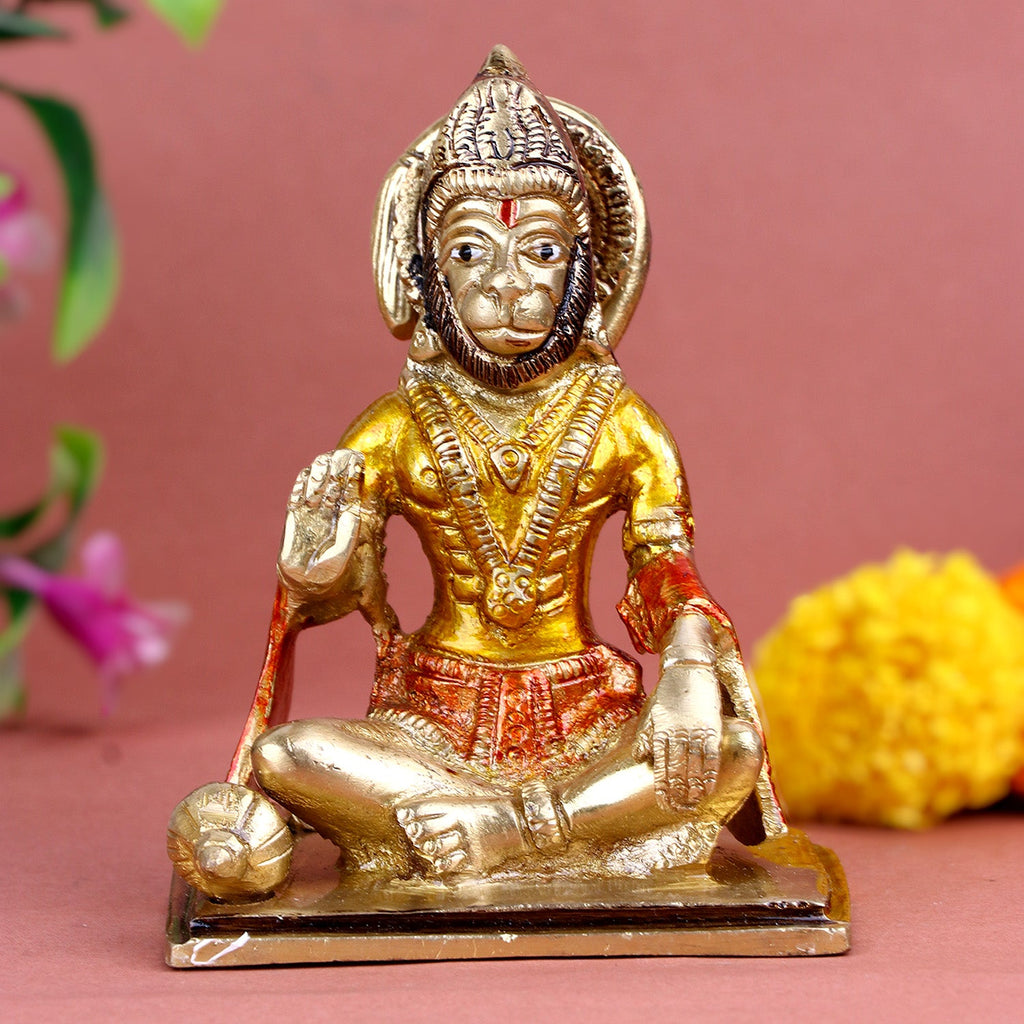 Blessed brass Hanuman idol, seated in a meditative posture with legs crossed and one hand raised in a gesture of blessing, symbolizing strength, devotion, and divine protection. Perfect for pooja rooms and spiritual spaces. India’s Largest Pooja Accessories Brand – www.satvikworld.com