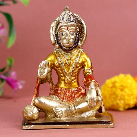 Blessed brass Hanuman idol, seated in a meditative posture with legs crossed and one hand raised in a gesture of blessing, symbolizing strength, devotion, and divine protection. Perfect for pooja rooms and spiritual spaces. India’s Largest Pooja Accessories Brand – www.satvikworld.com